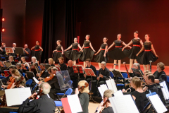 Ballerinas dancing with full orchestra