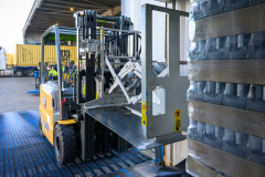 Fork lift truck with specialist loading kit attached loading truck