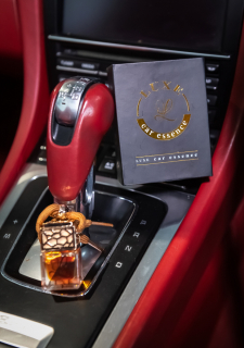 car essence product taken on-location in luxury vehicle