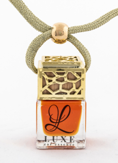 close-up image of car essence bottle