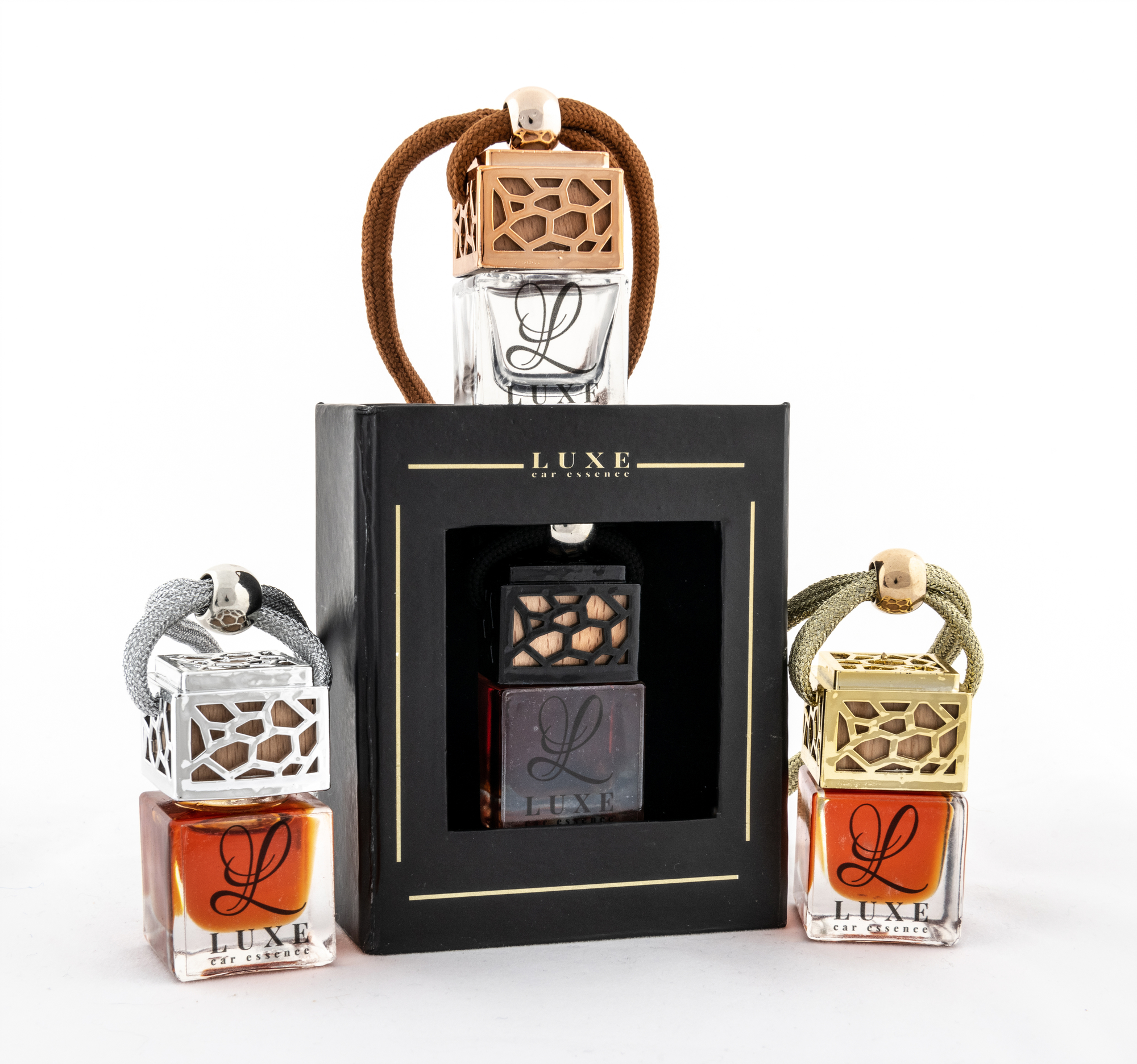 Product Marketing and e-commerce image of three car essence bottles and packaging taken in the studio of image and events photography in Peterborough, Cambridgeshire