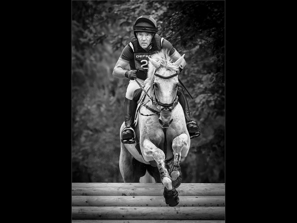 Defender Burghley Horse Trials 2024.XC-CC5 Cross Country Austin O'Connor (IRL) on Colorado Blue jumping at the Defender Trout Hatchery